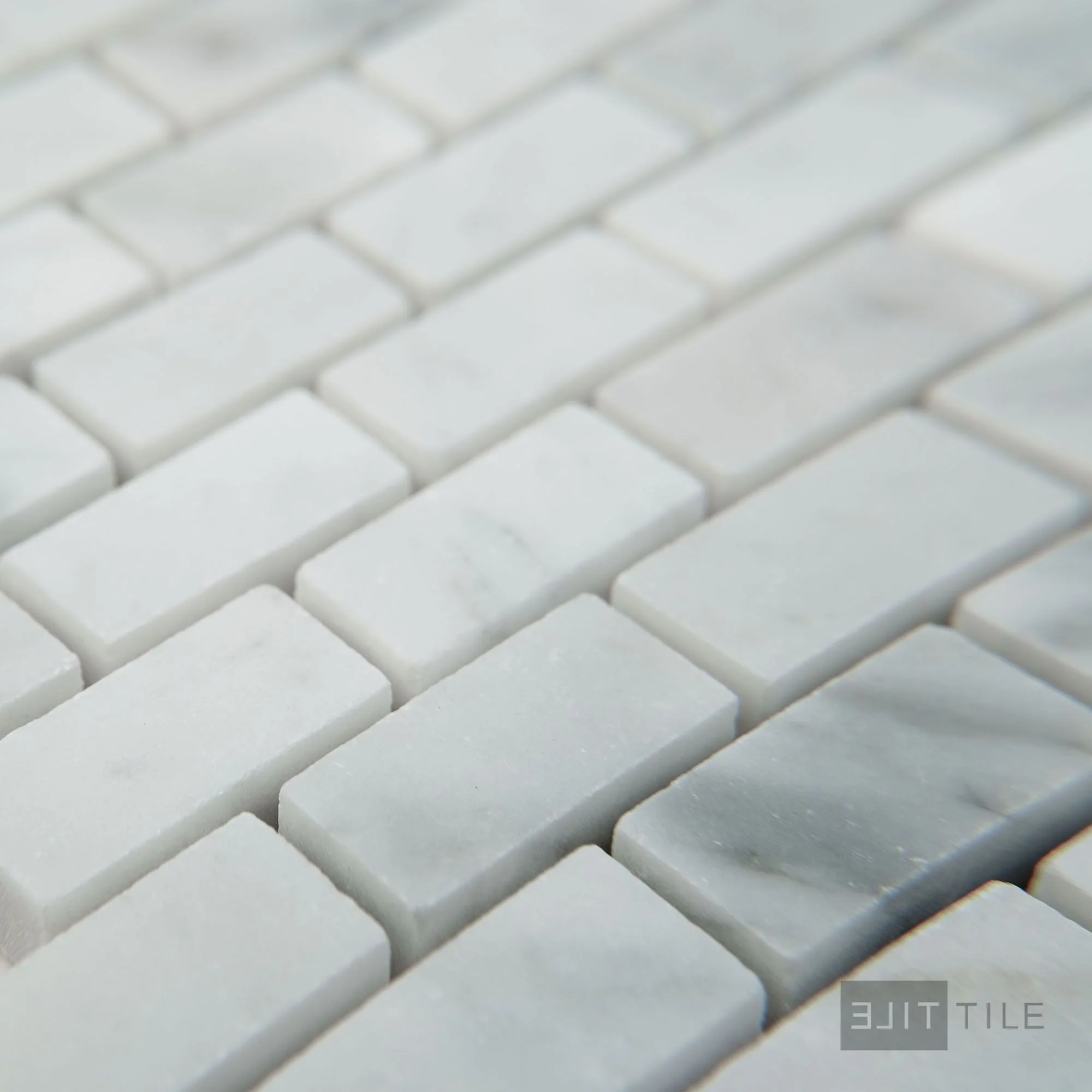 White Carrara Marble 5/8X1-1/4 Brick Honed Mosaic - Image 3